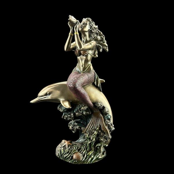 Sirena na delfinu 